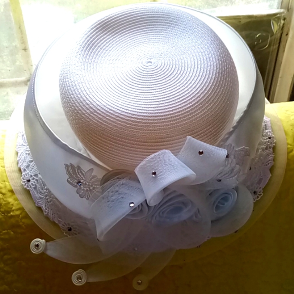 White Sunday hat with beeds and stones and white flowers
